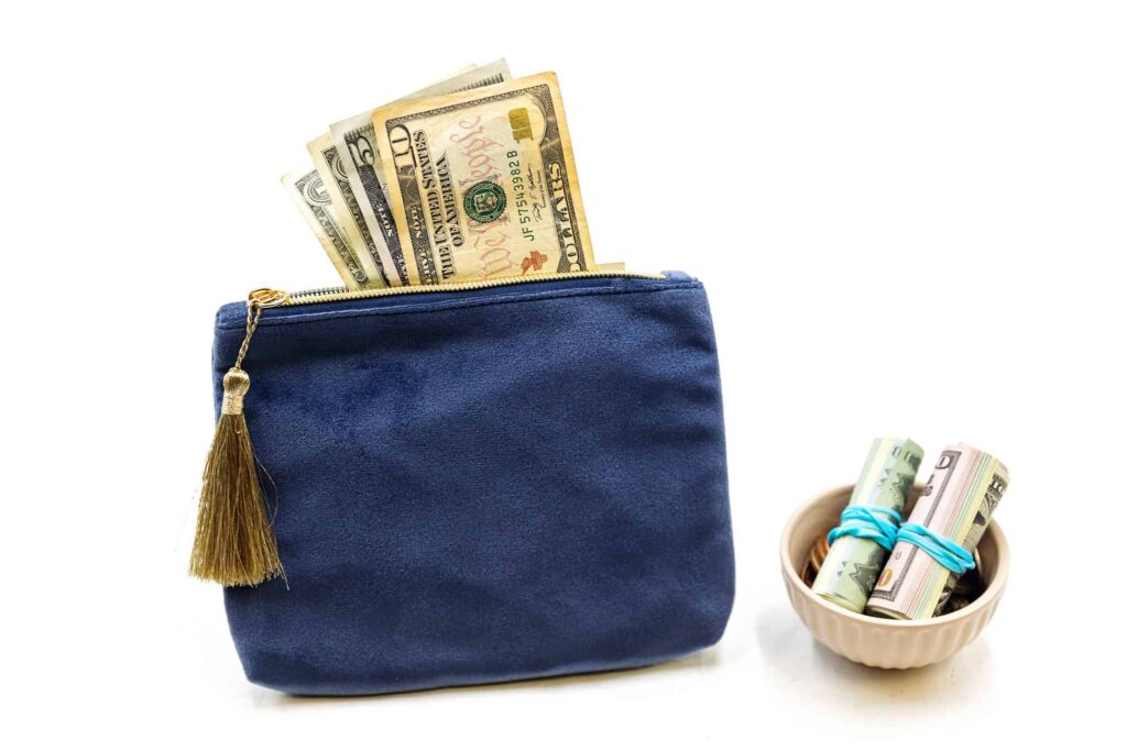 money in blue pouch