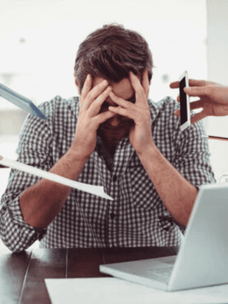 man stressed from work