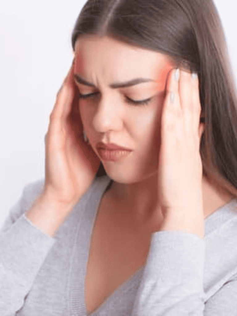 woman with migraine from stress