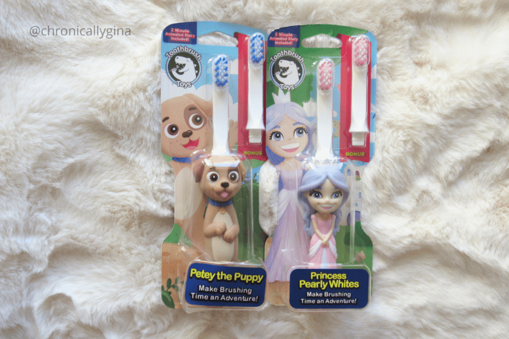 Toothbrush Toys featuring Petey the Puppy and Princess Pearly Whites with bonus brush heads, a fun kids’ dental care gift featured in a holiday gift guide by budget.